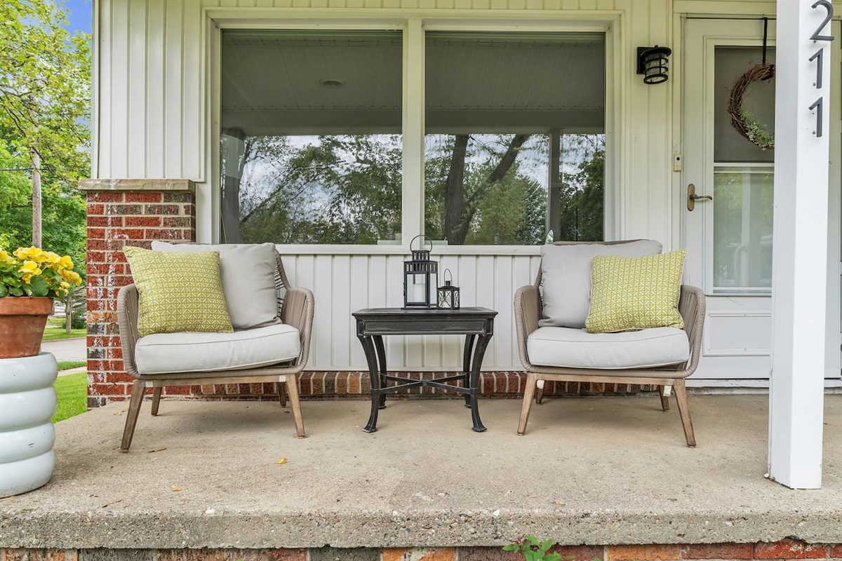 Enjoy the peaceful neighborhood on the spacious front porch. 