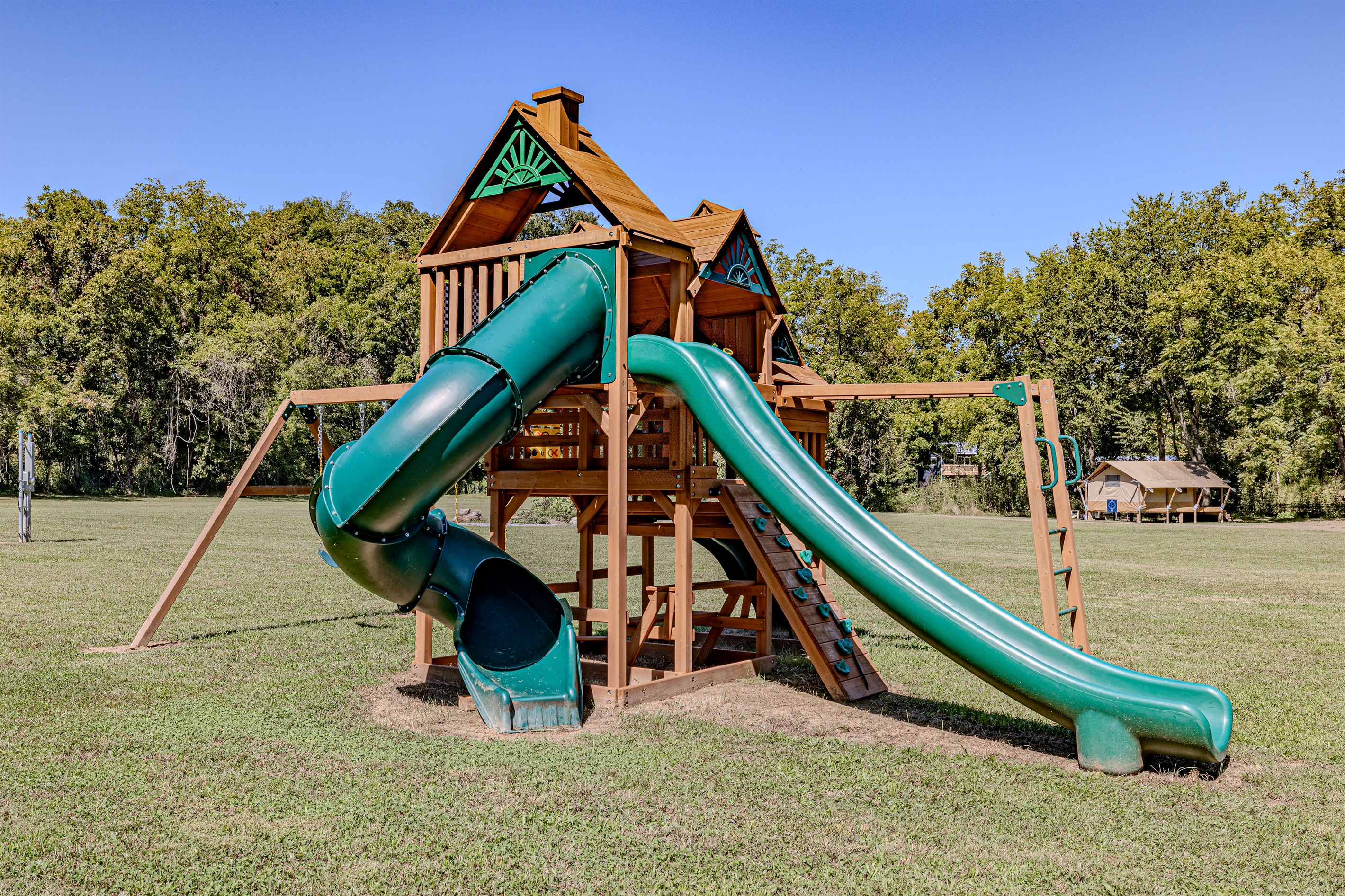 The playset can't be beat! There is even a picnic table nestled at the bottom!