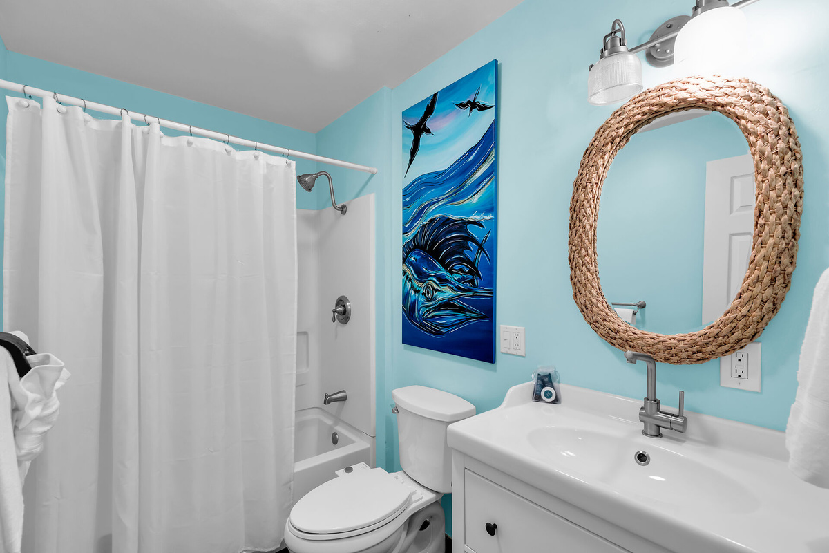 Guest bathroom upstairs with bathtub