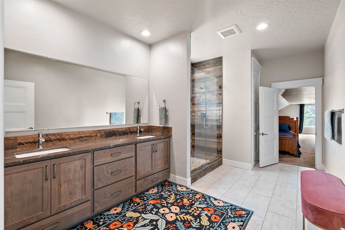 Indulge in this gorgeous master bathroom and walk-in shower.