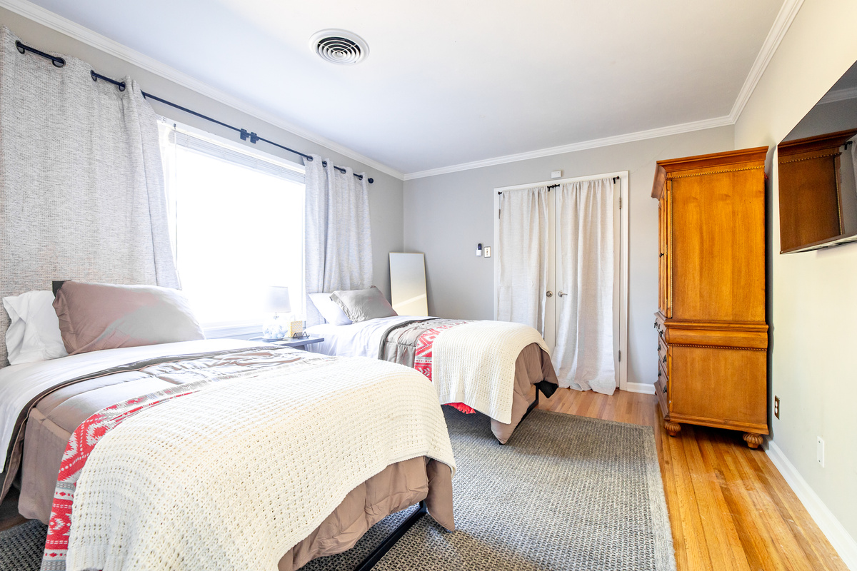 Bedroom 2. Two twin beds + TV + armoire