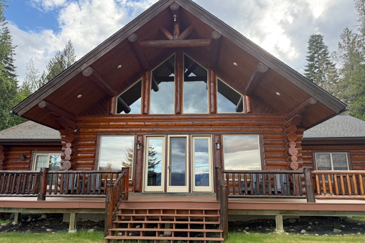 Hand-hewn logs create front of cabin