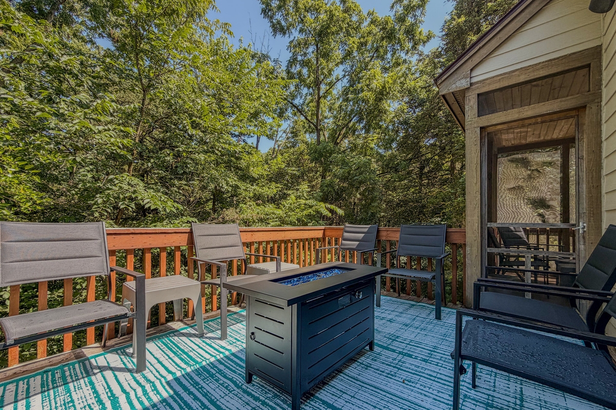 Enjoy the outdoors on the large deck -- warm up on cool nights with the firepit table. 