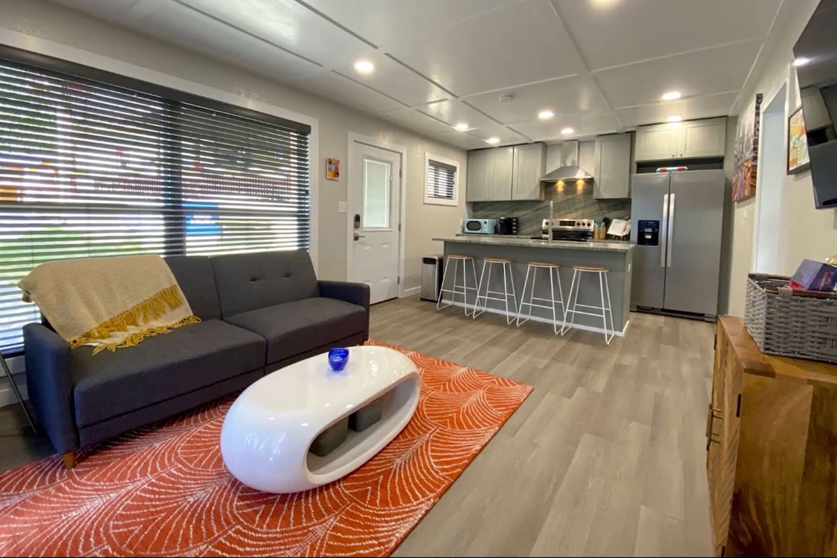 Living Room: Bright and modern with a chic design, perfect for relaxation and entertaining!