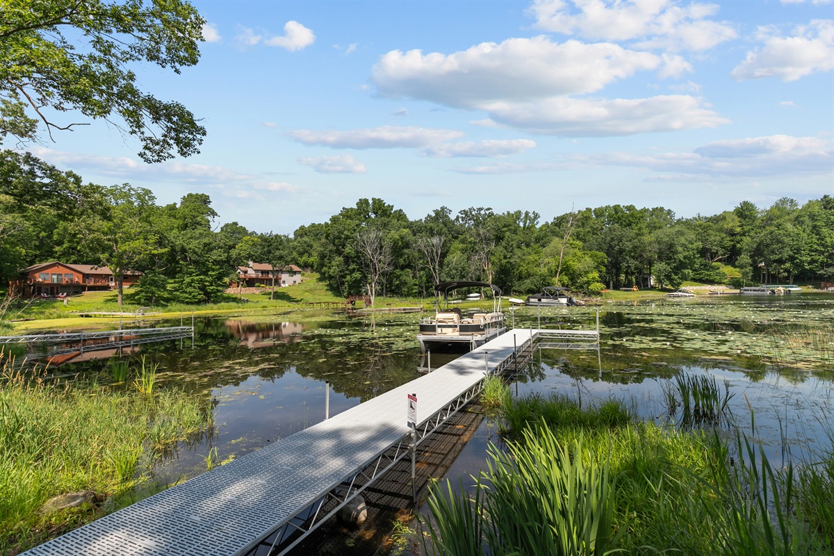 Spend your days on the pier—whether you're casting a line, launching a kayak, or watching the sunset, it’s the heart of lake life.