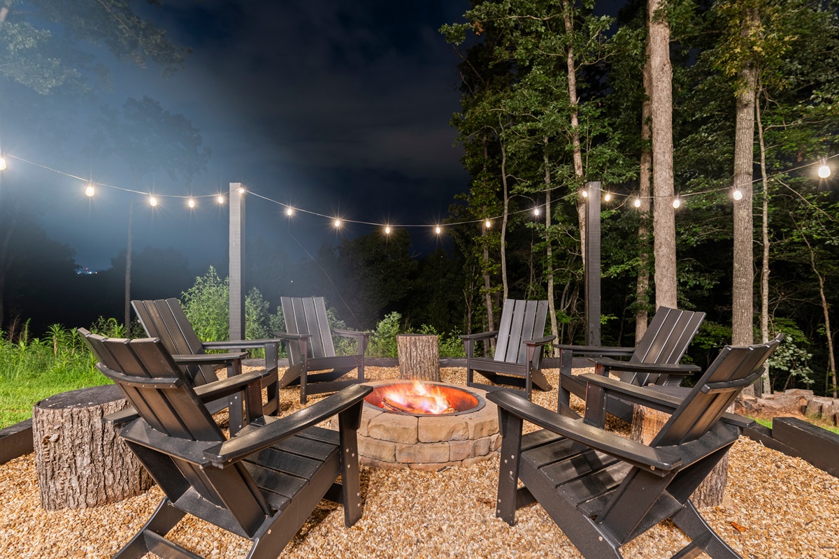 Roast s'mores and create everlasting memories by the fire pit under hanging lights.