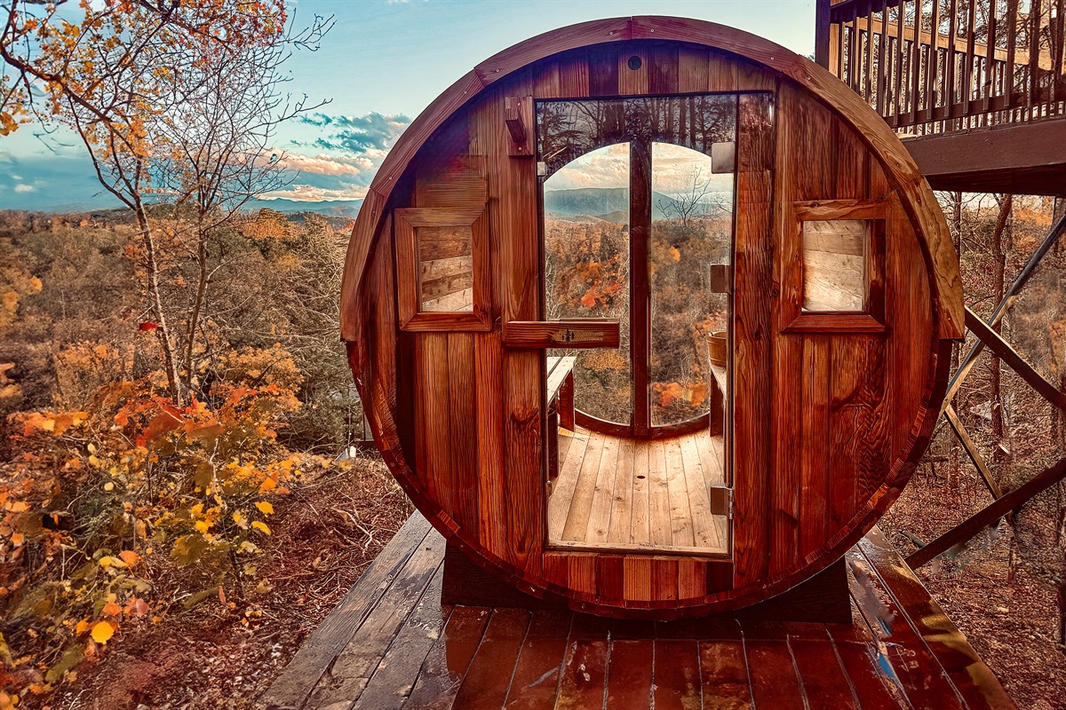 Get STEAMY in our panoramic, glass wall, mountain view barrel sauna!