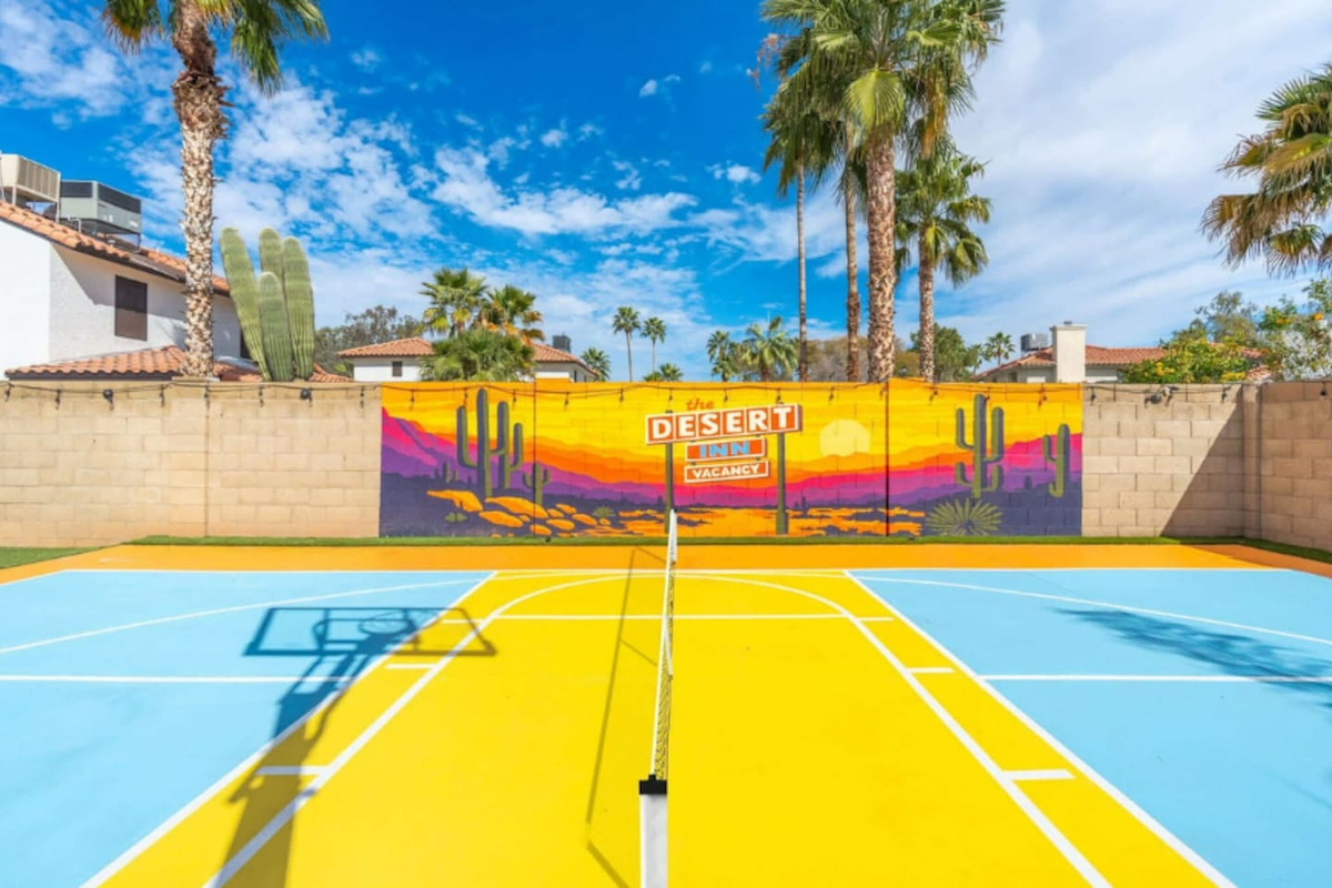 Full basketball court with vibrant desert mural—shoot hoops under Arizona skies with a view that rivals the game itself.