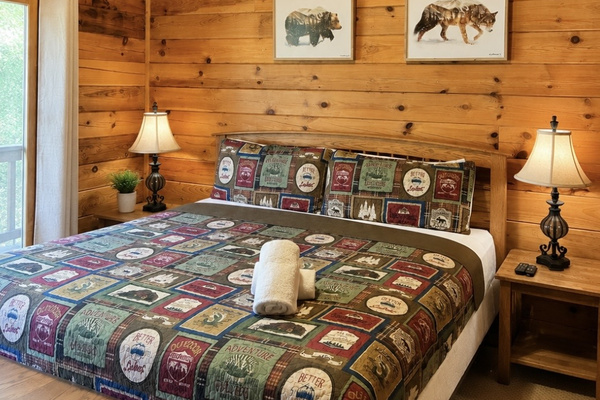Bedroom on main floor, also has a large Jacuzzi tub inside the room. 