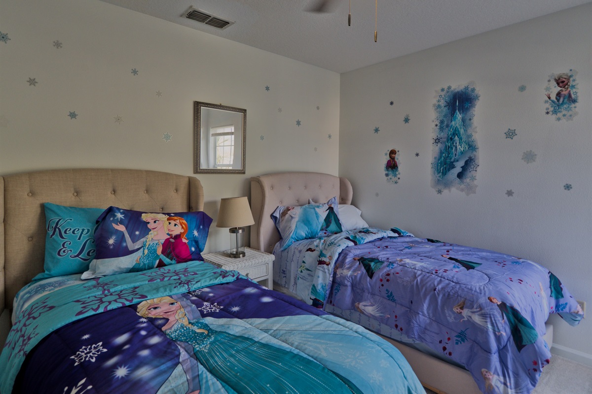 Frozen room with two twin beds.