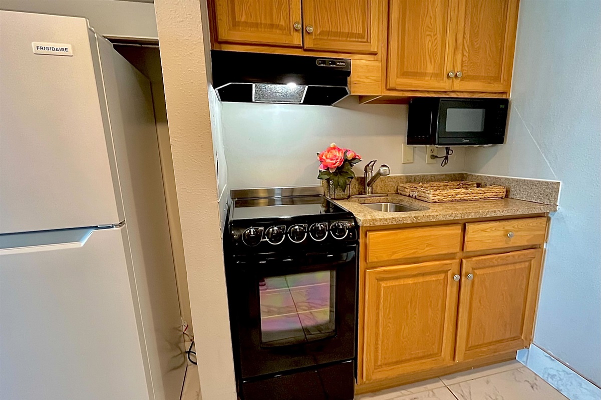 Prepare meals with ease in the convenient kitchenette, complete with all necessary appliances.