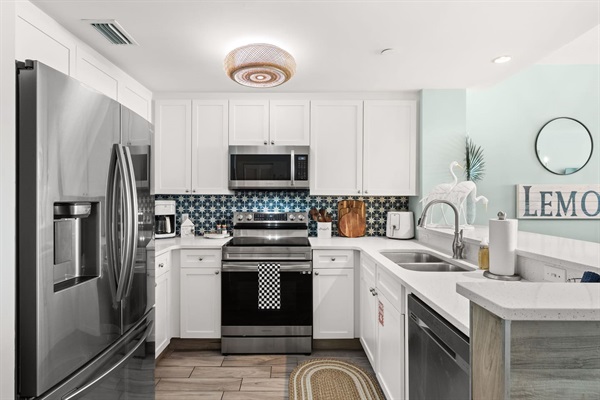 Fully stocked Chef's kitchen with stainless steel Samsung appliances