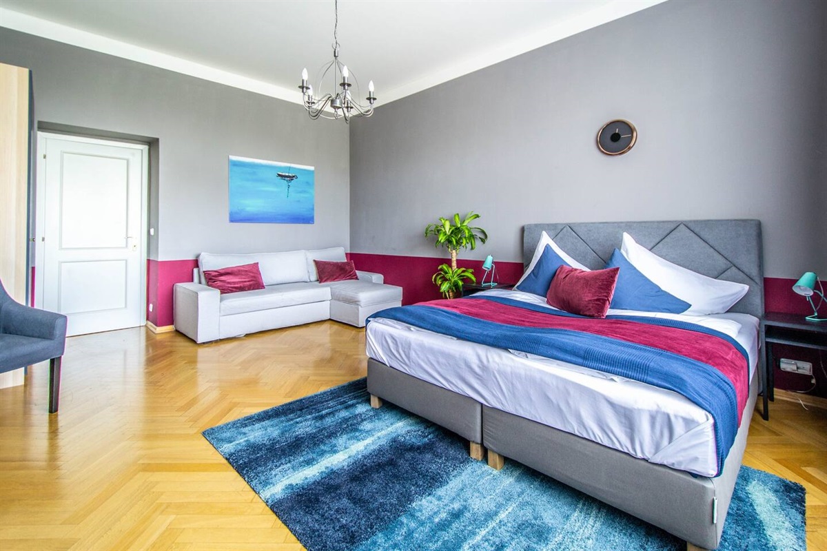 Spacious bedroom with spring box  king size bed (180 cm), comfy sofa which can be converted into double bed, cable TV and a wardrobe for your clothes.