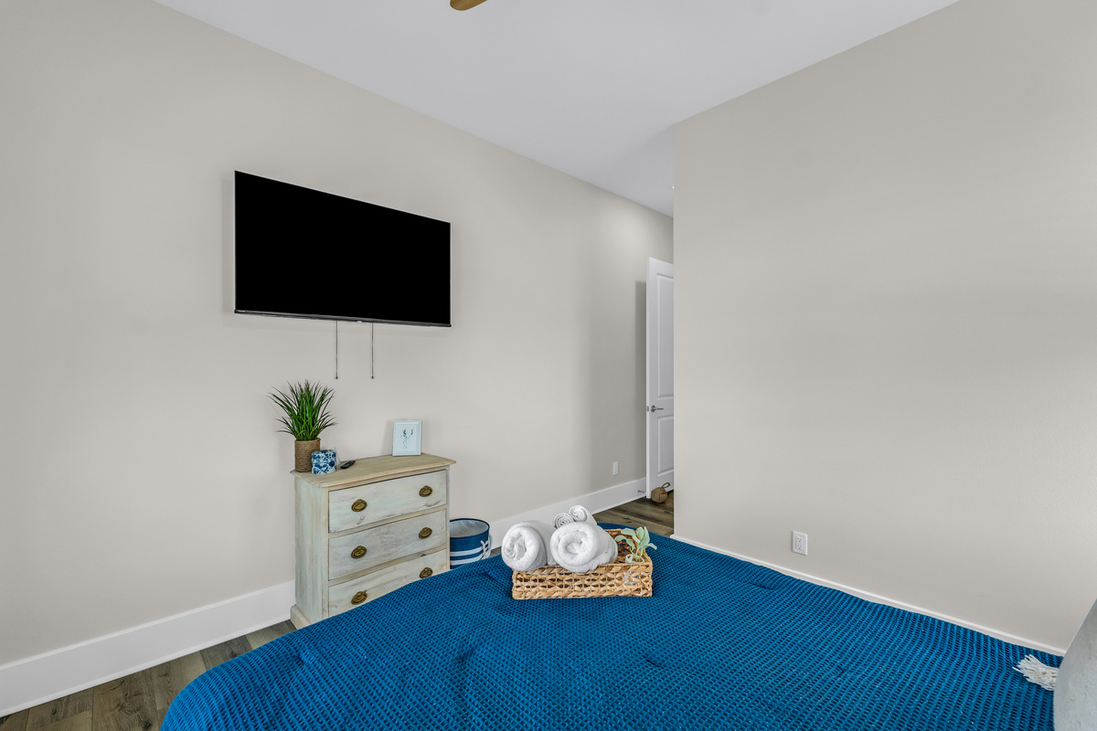 Costa Cristal Bedroom 3: Unwind in this elegant queen bedroom featuring a TV for your entertainment.