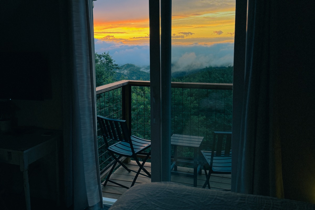 Our Top Floor Queen View Bedroom has a private balcony with sliding door to enjoy the mountain & valley views - the reason you stay in Seven Devils - high above it all! It also has a Desk, Chair, Roku Smart TV, & Twin Futon. Be nice & share that view!