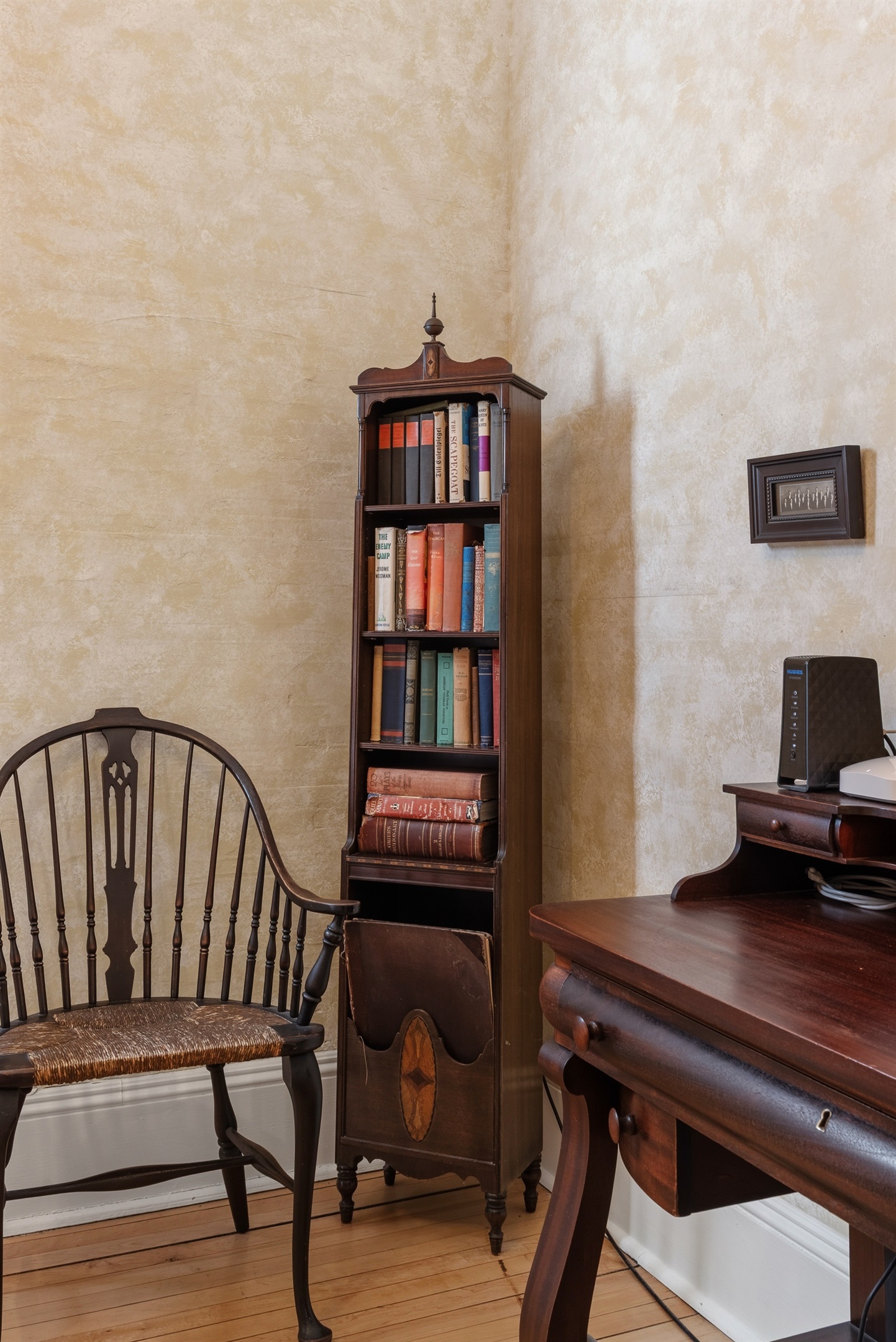 Reading nook w/ antique chairs & shelves of old books