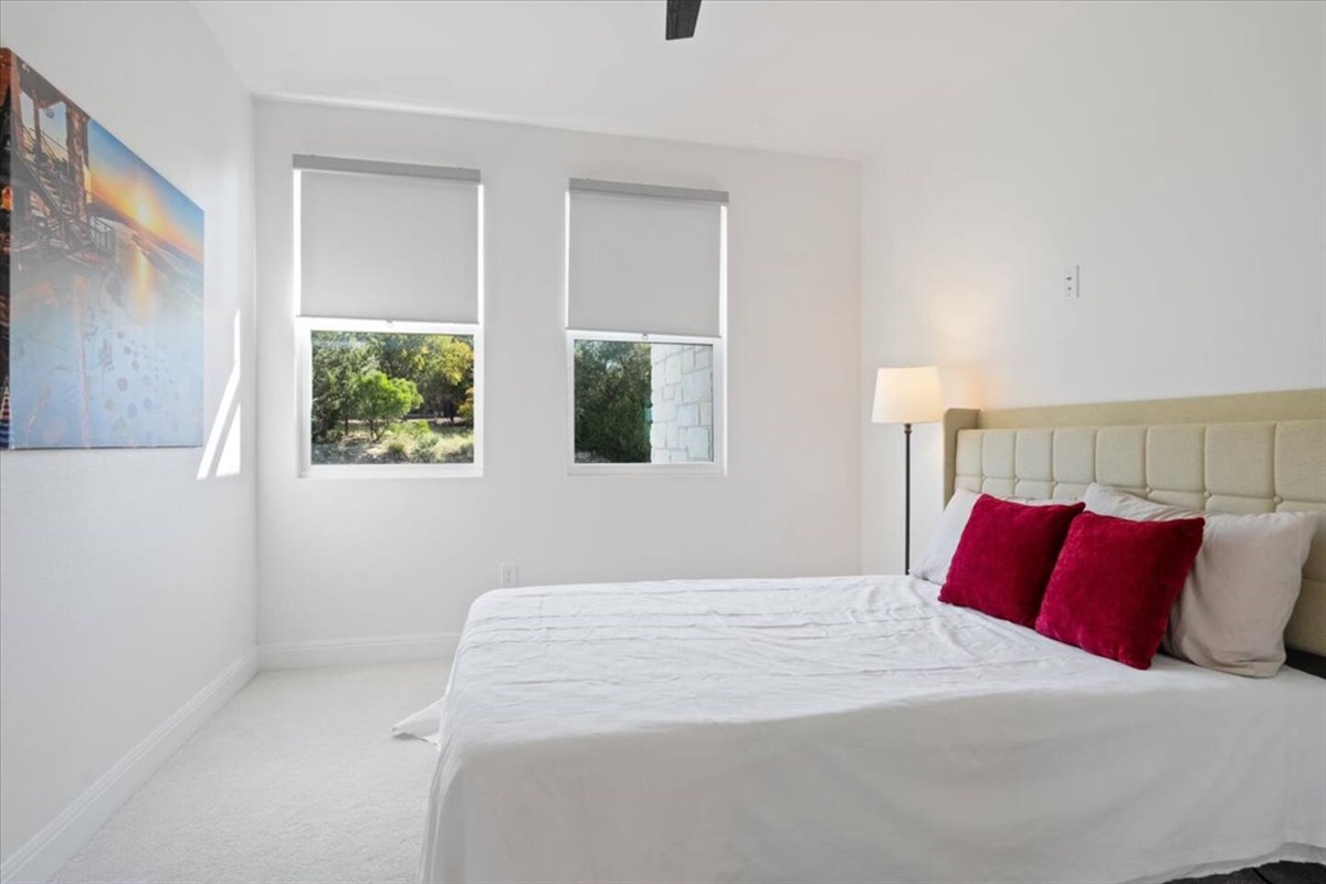 bedroom 2 with queen bed, bathroom