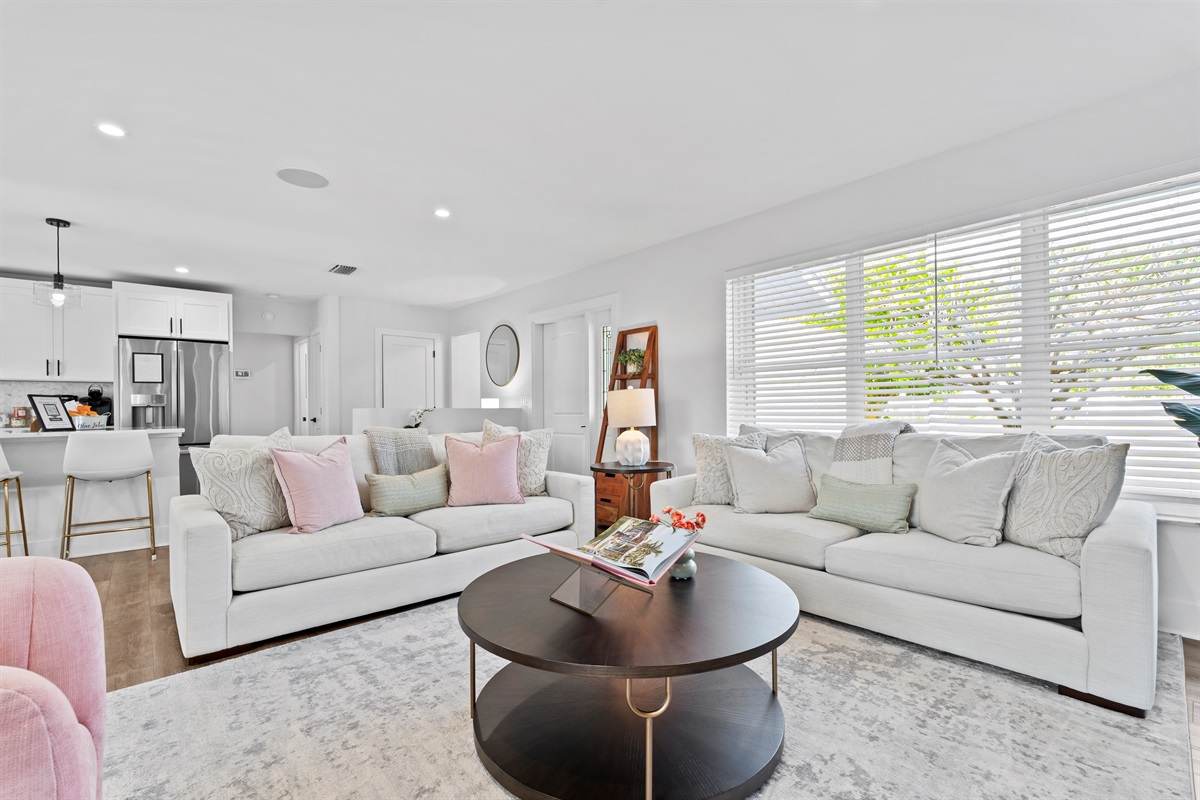 The open-concept layout creates the perfect flow for entertaining, relaxing, and spending quality time with family and friends in effortless comfort.