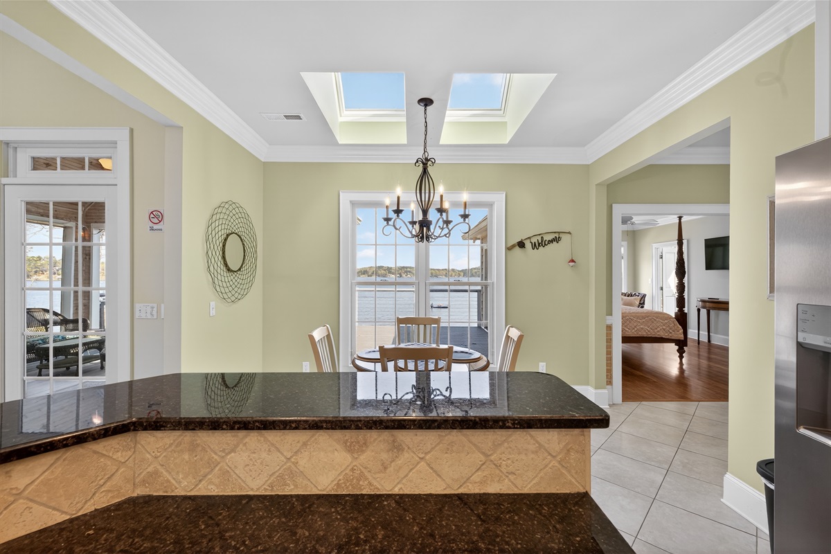Kitchen facing water and kitchen table