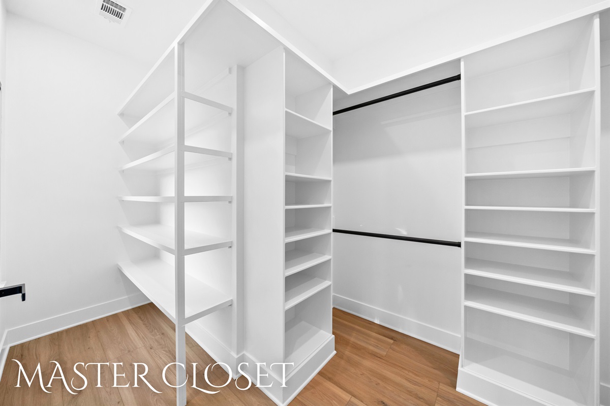Every fashion lover's dream closet. Plenty of room for clothes, shoes, and accessories.