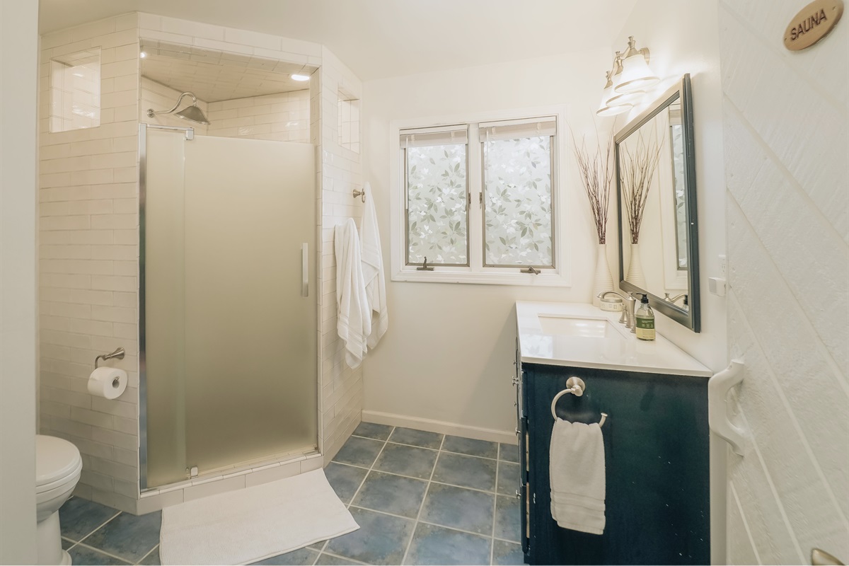 A real spa like feel! The primary bathroom offers a walk in shower with multiple shower heads, a sink, a linen closet, a toilet, and a SAUNA. Be ready to leave feeling rejuvenated. 