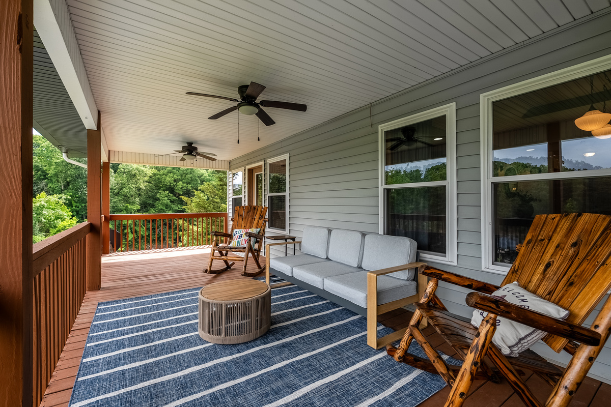 Views, fans and cozy seating from the top deck. Access through kitchen or master suite