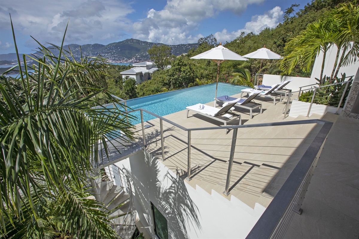 Beautiful pool deck with surrounding views