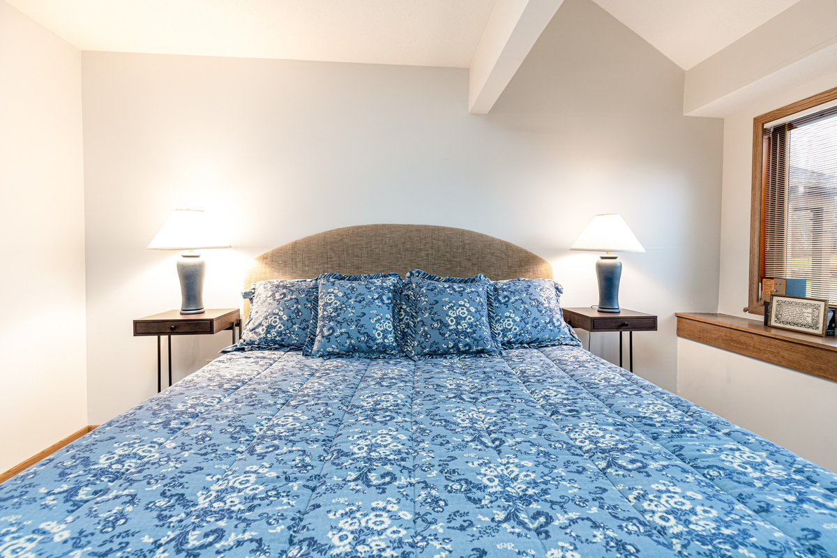 The Main floor bedroom features a king size bed and an ensuite bathroom. 