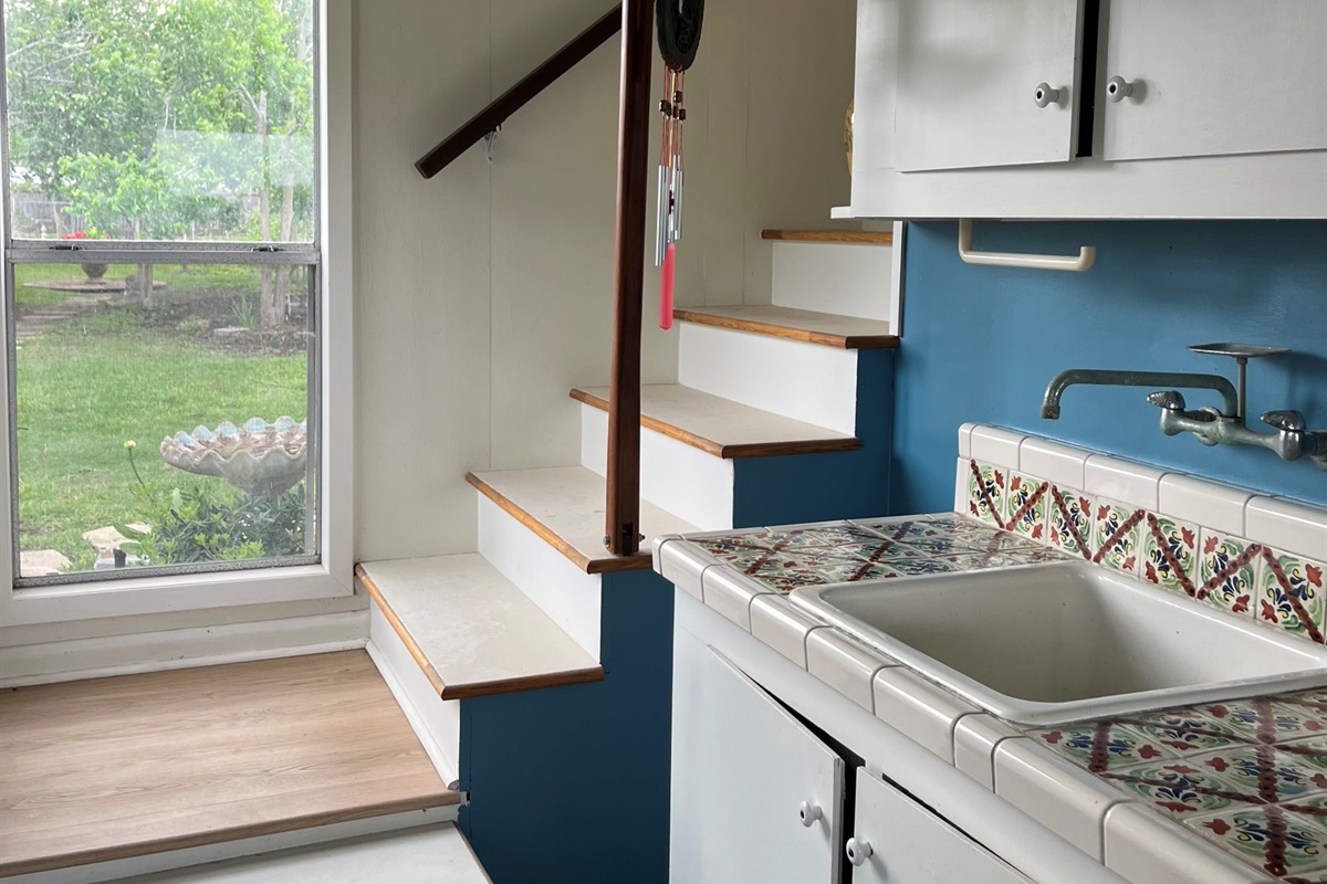 Stair landing below to the Veranda