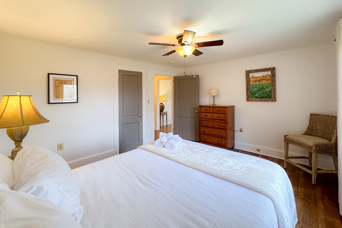 Our guest bedroom features a queen size bed with comfy, high thread count linens and shredded bamboo pillows! The beds are cooling memory foam with a medium firm feel.