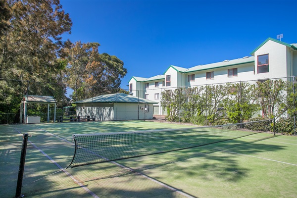 The tennis court is for the use of residents and guests. 