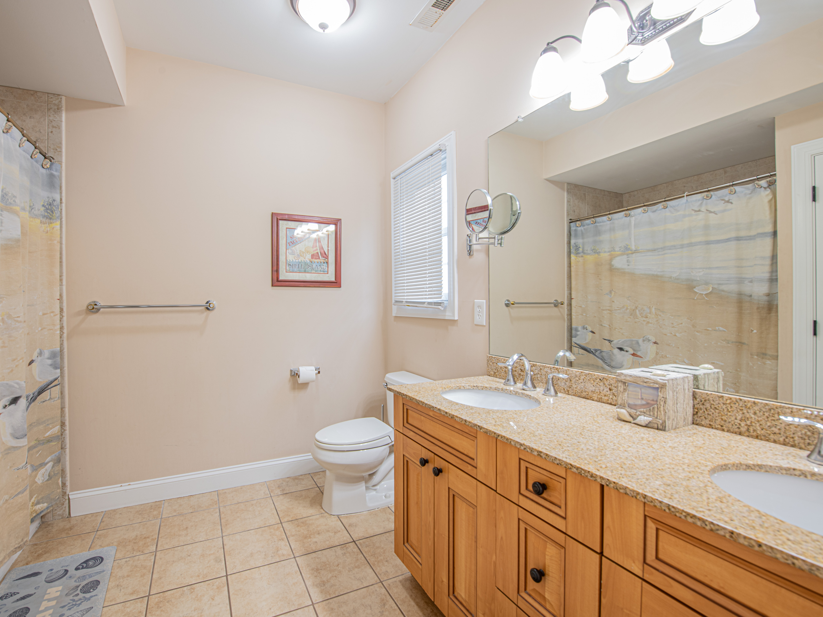 Bathroom 2 with Double Vanity Sink, Large Mirror, and Shower