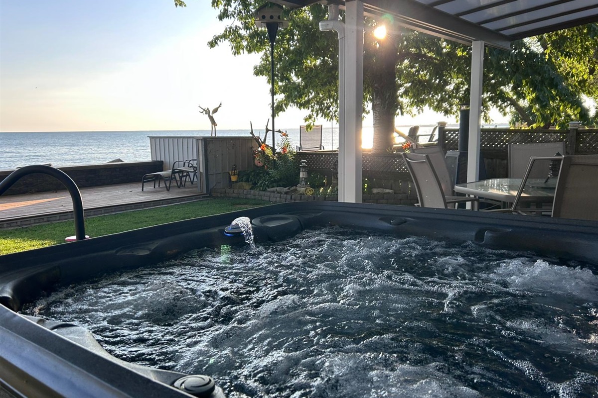 Unwind in the hot tub with Lake Erie as your backdrop.