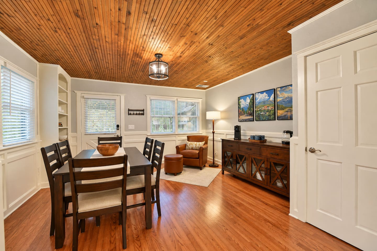The connected downstairs retreat offers extra space to spread out, with its own dining area, comfortable reading chair and kitchenette with a full-size refrigerator available, plus microwave and coffee station.