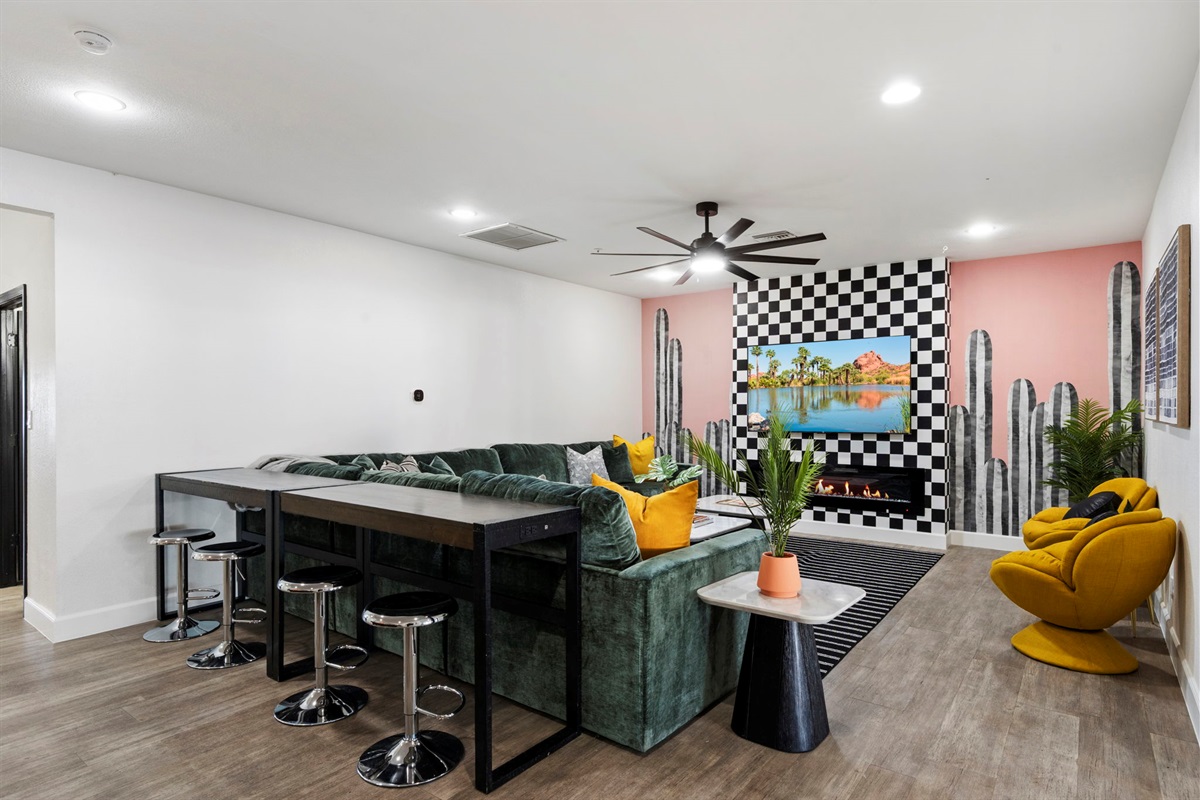 One of the largest & most plush sofas in Scottsdale! Behind the photo is the pool table, 4 stool high top table and Connect 4!  To the left is the kitchen and to the right is the game room!