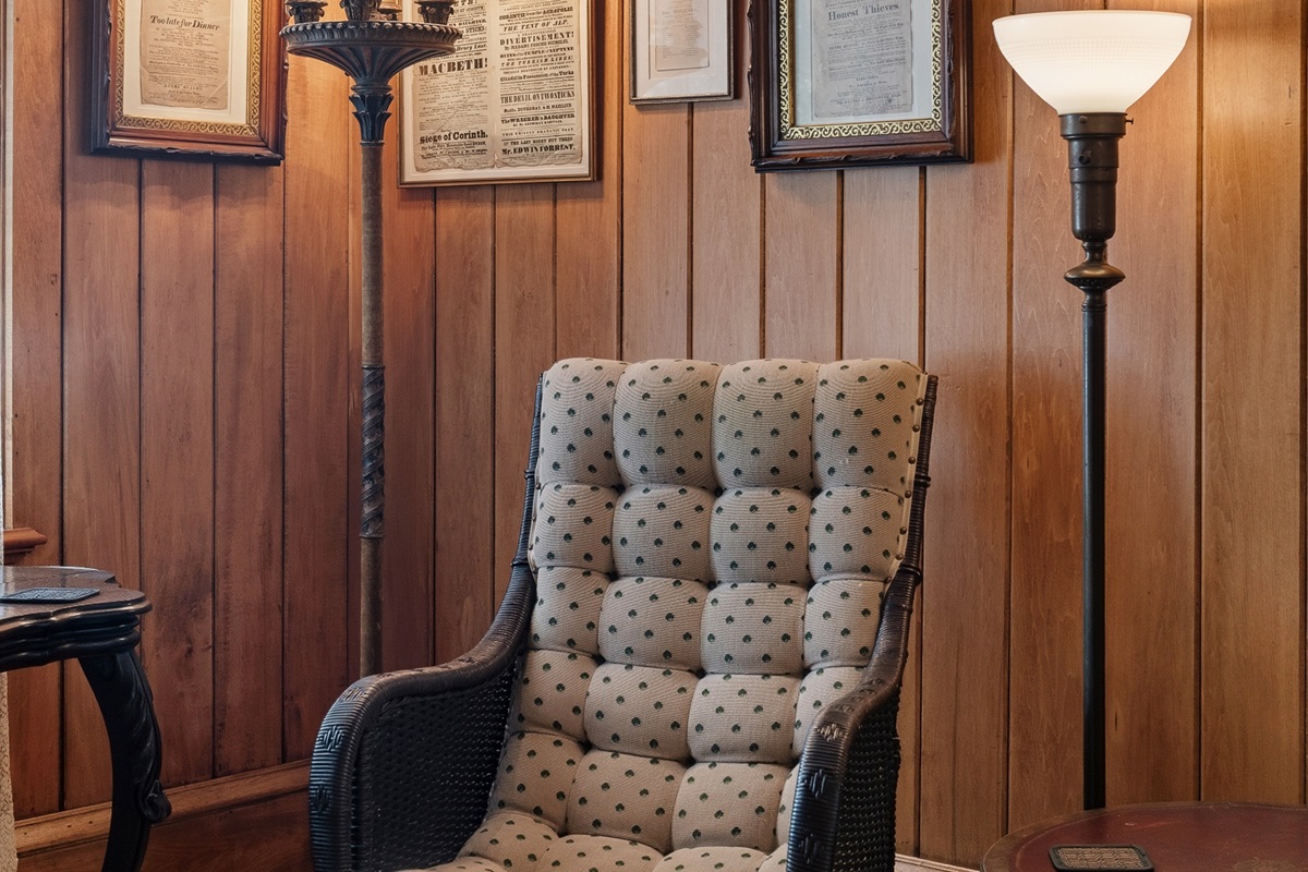 Quiet reading nook w/ upholstered chair & floor lamp