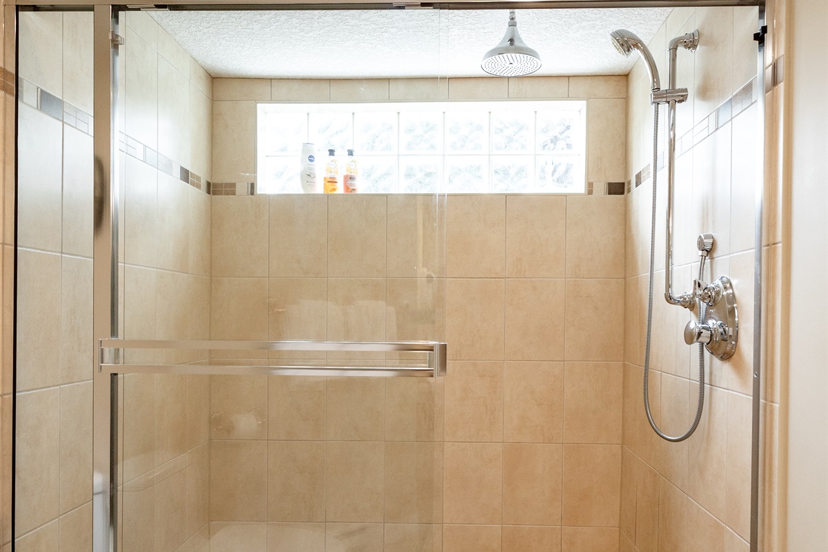Unit B. Oversized Rain shower! Super large bathroom. Easy to move around.
