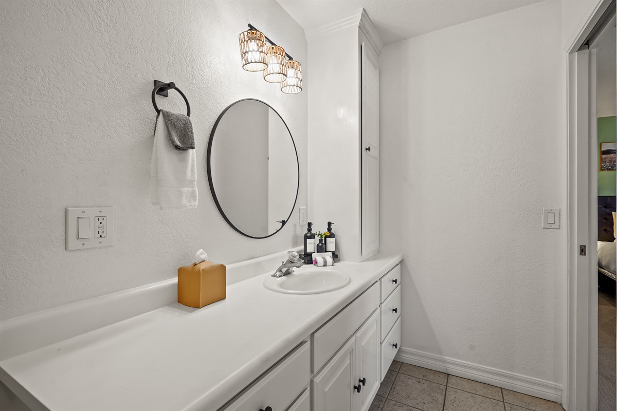 This private ensuite bathroom offers a spa inspired atmosphere perfect for slow mornings and relaxing evenings.