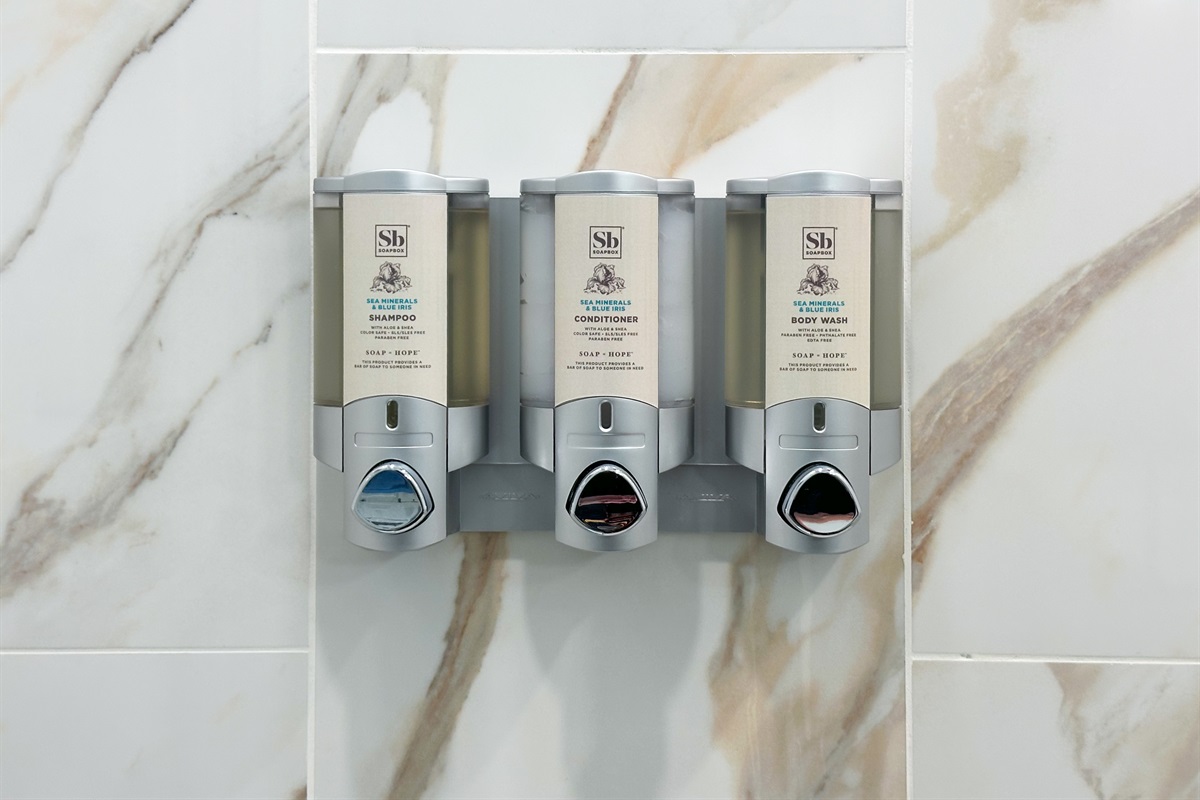 We stock premium soaps in convenient wall-mounted containers.