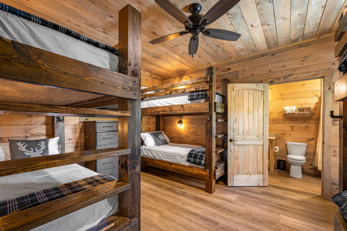 Bunk room features 6 twin beds and a private bathroom. 