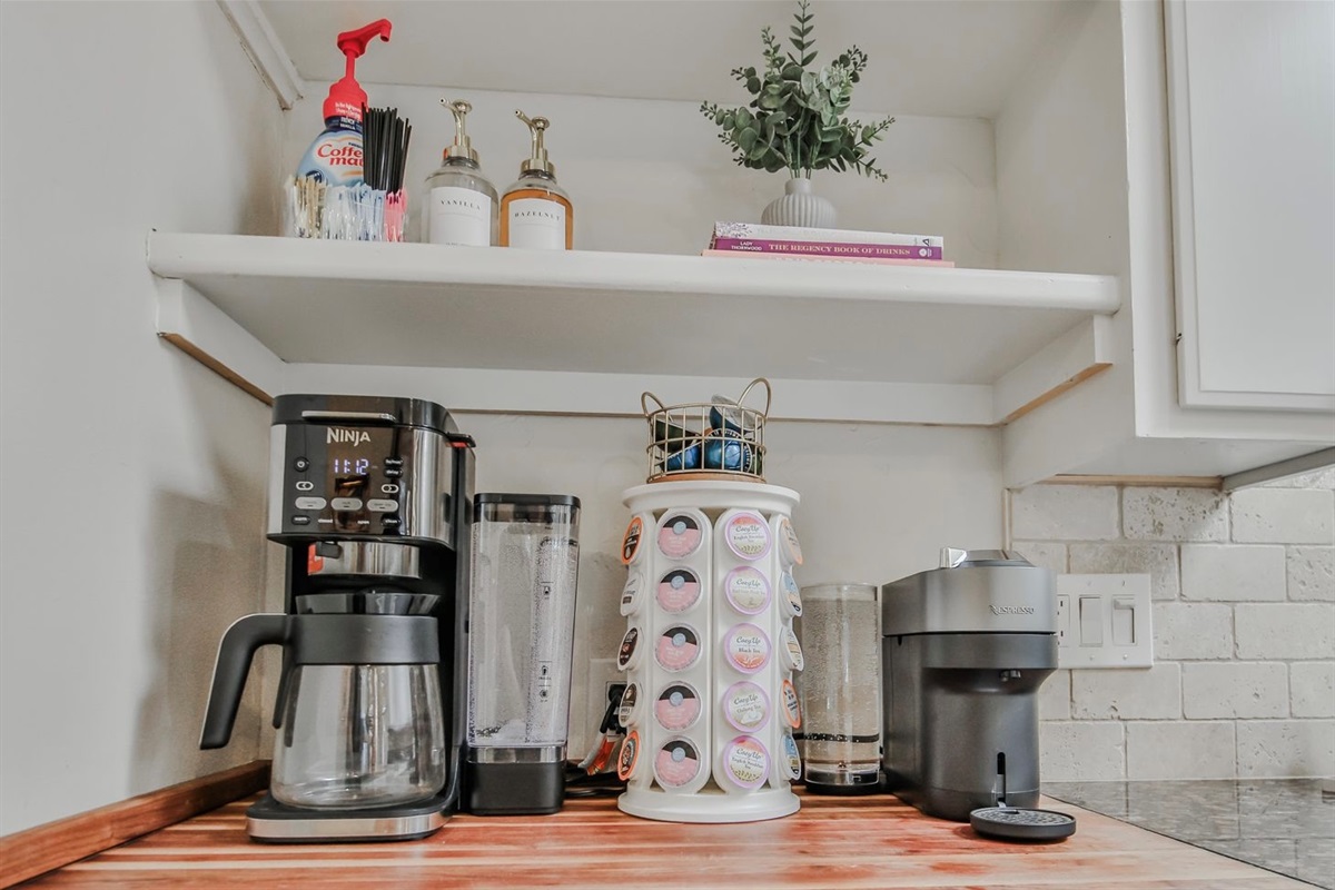 Even the Queen wouldn’t dare rise without it—classic brew, Keurig, or decadent Nespresso to charm your senses and spark your day.