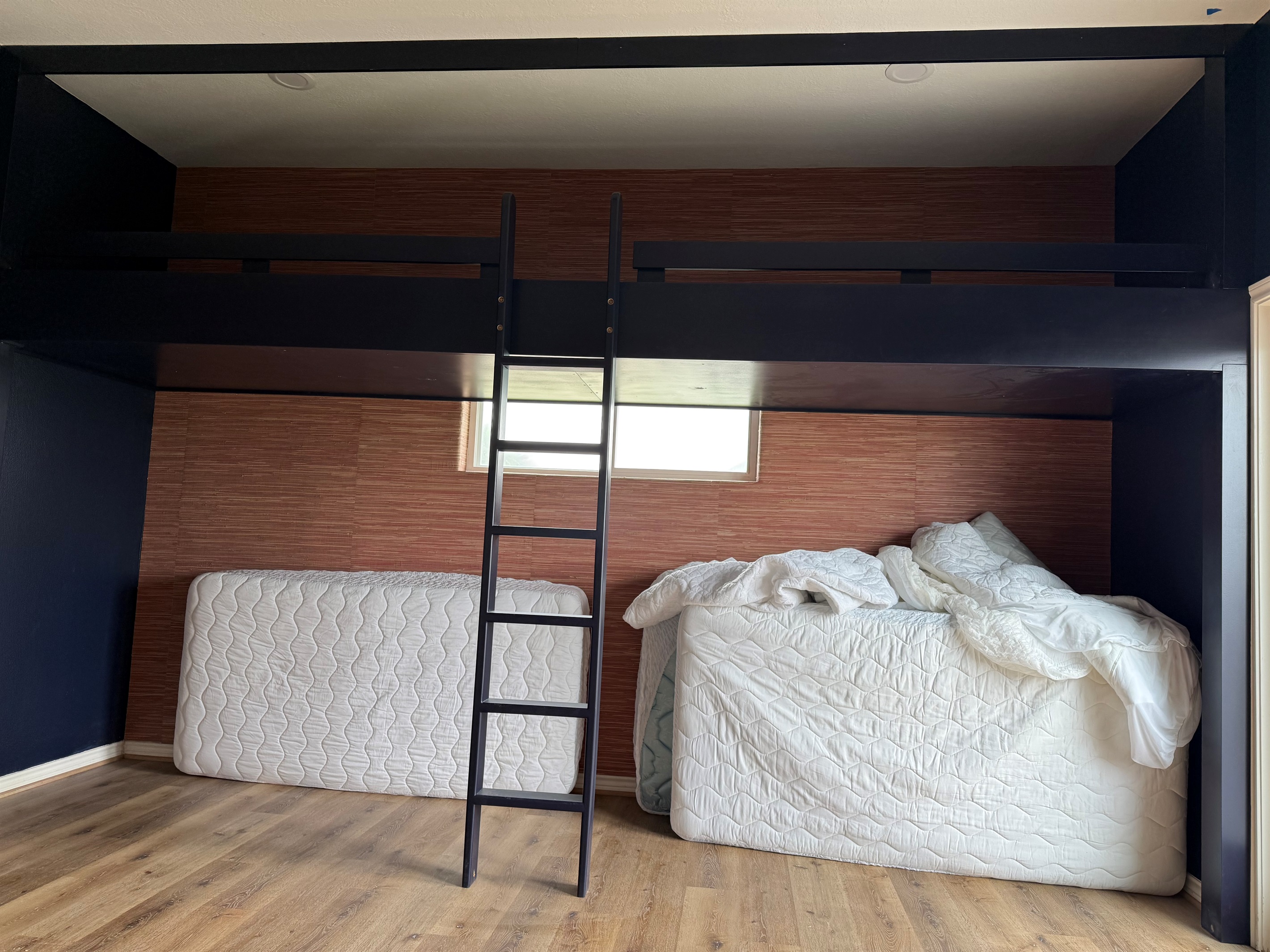 Upper XLT lofted bunks are installed.  Queen beds will go underneath. This bedroom is coming along! 5/7/26