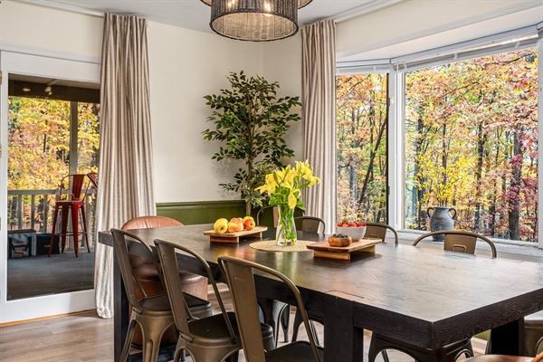 Meals taste better with a view. Gather around the table and enjoy the forest right outside the window.
