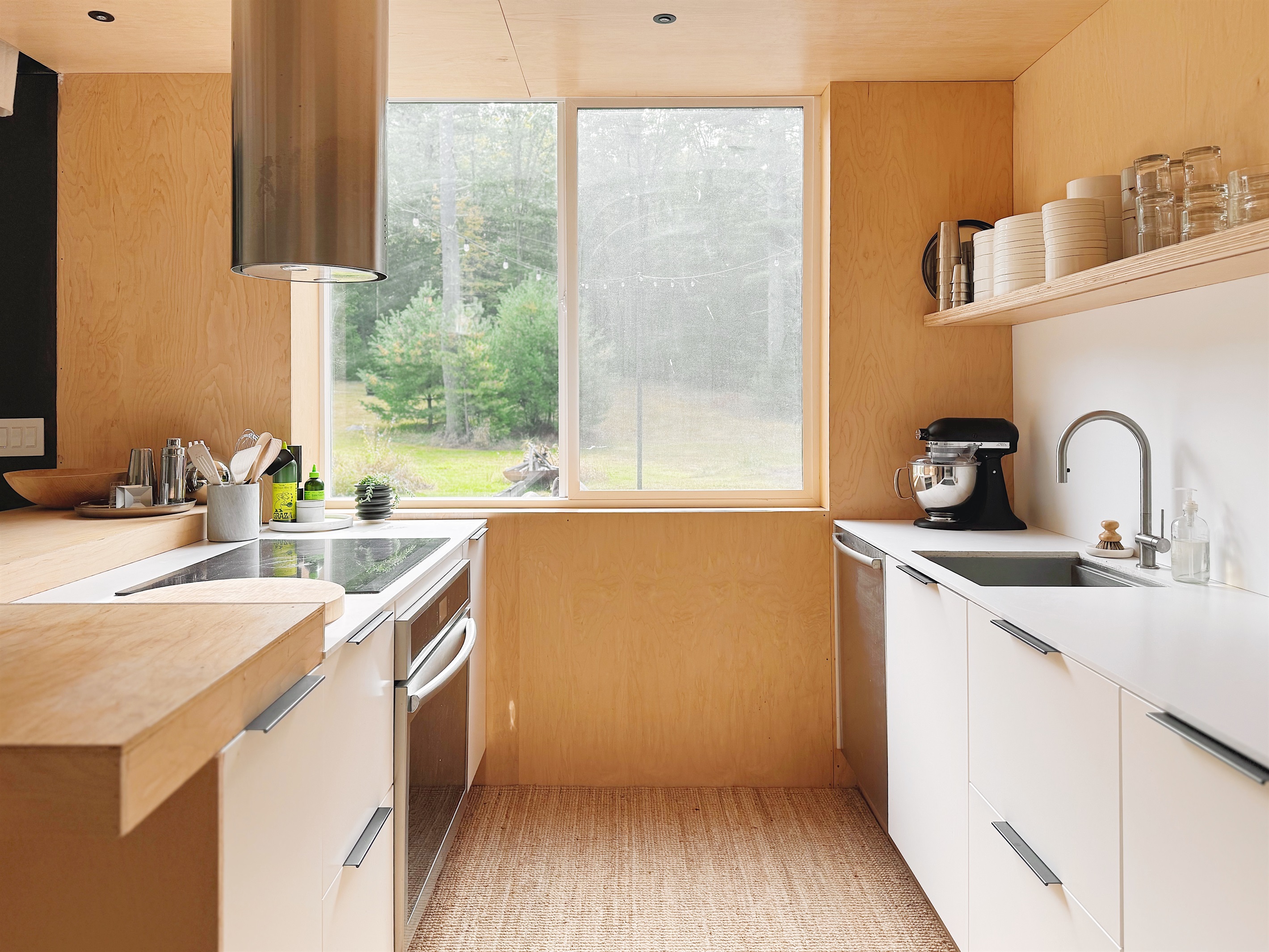 Kitchen with operable window overlooking the field
