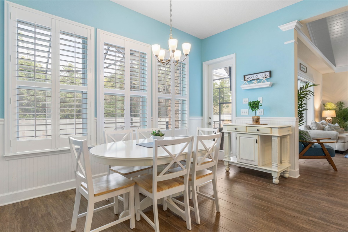 Gather here for slow breakfasts before the beach, card games in the afternoon sun, and easy dinners that stretch into evening—this bright coastal nook brings everyone together for the simple moments that end up meaning the most.