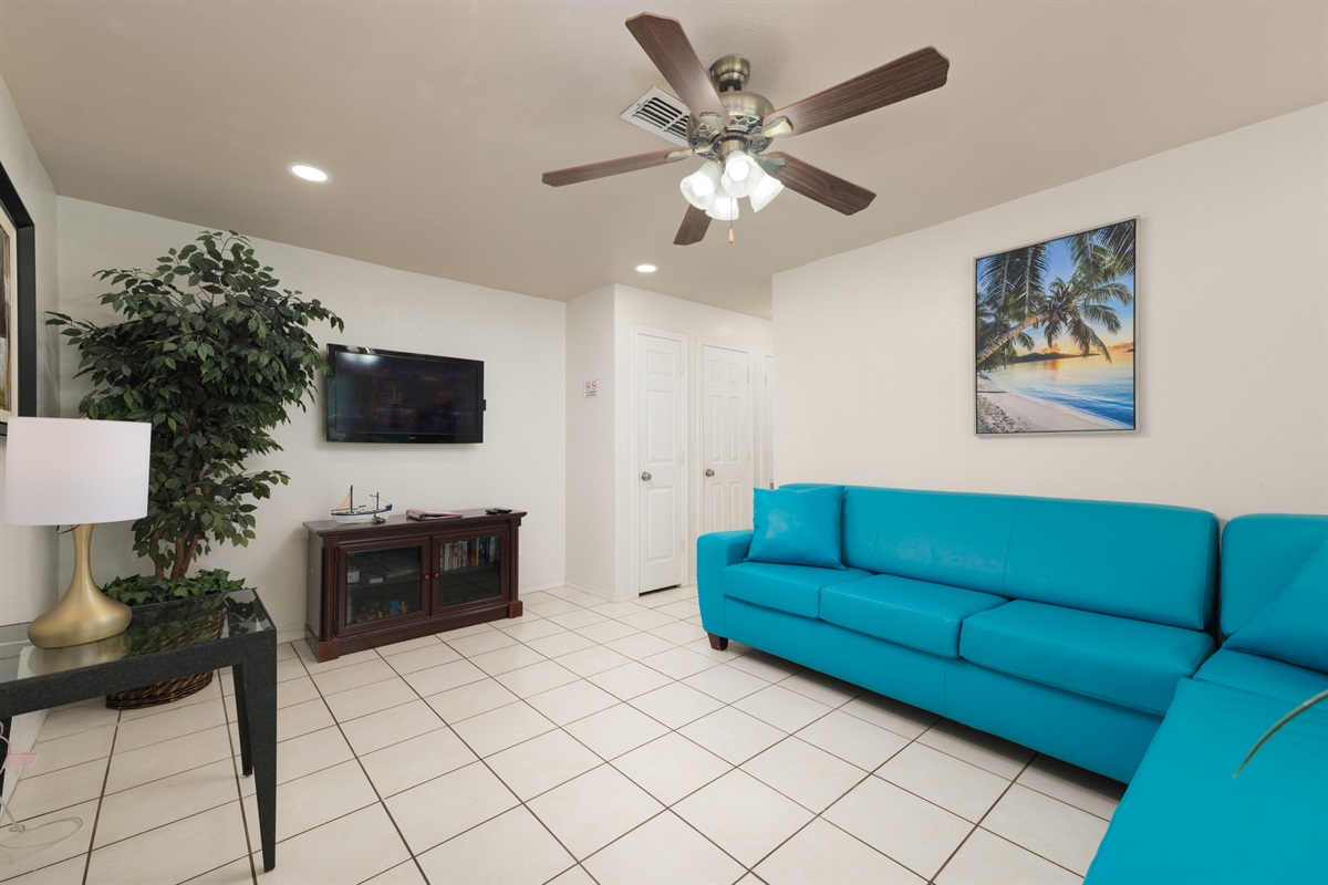 Living Room with our Signature Aqua Couches!