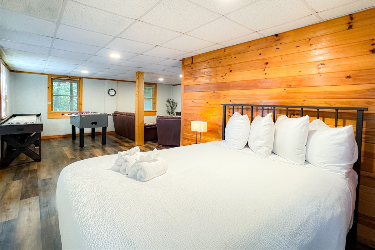 The lower level basement is accessible from an outside door(no inside access). The bed is a super comfy queen bed with high thread count, luxury sheets and bedding.