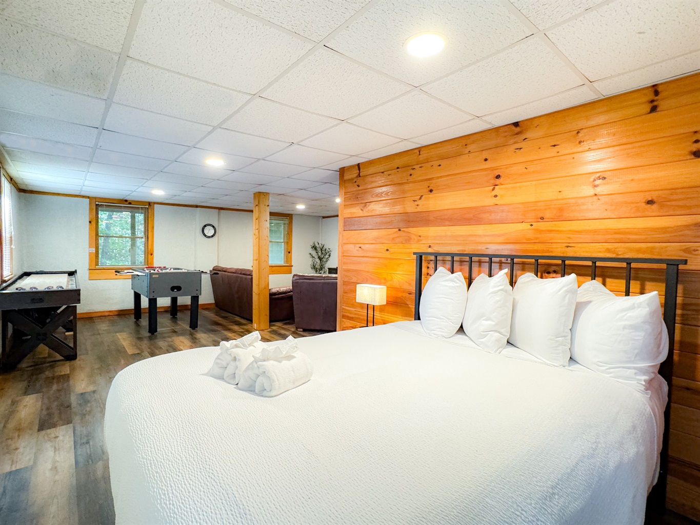 The lower level basement is accessible from an outside door(no inside access). The bed is a super comfy queen bed with high thread count, luxury sheets and bedding.