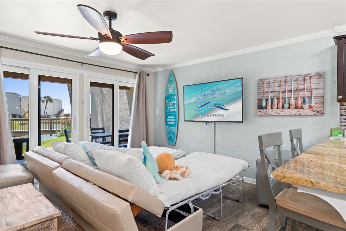 Living Room with 2 Twin Pullout Ottoman Beds