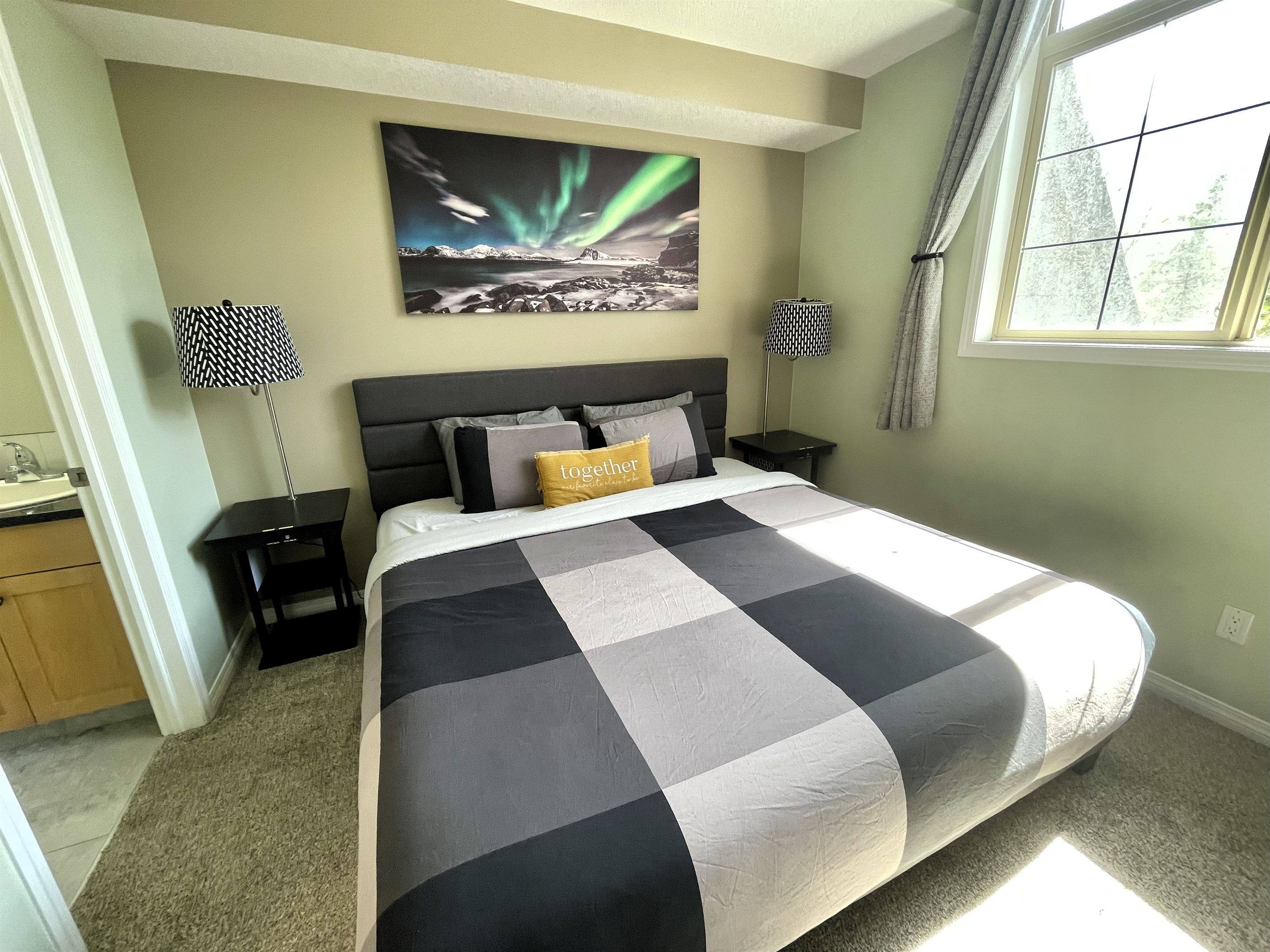 Master Bedroom with ensuite bathroom. Mountain view, and 55" TV.  Located on the 2nd floor.